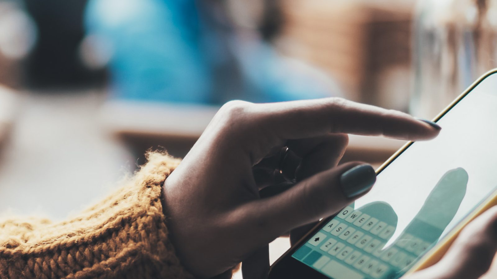 girl hold in hands yellow empty screen mobile phone close up, person type message on smartphone in sun cafe, relax tourist travels planning trip, hipster enjoy journey in cityscape, lifestyle holiday concept, internet online